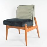 Black and white armchair without armrests