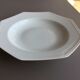 8 white hollow plates in Limoges porcelain