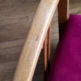 Ancien fauteuil bas colonial style Art Déco en bois.