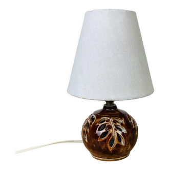 Lampe boule céramique ajourée feuillage