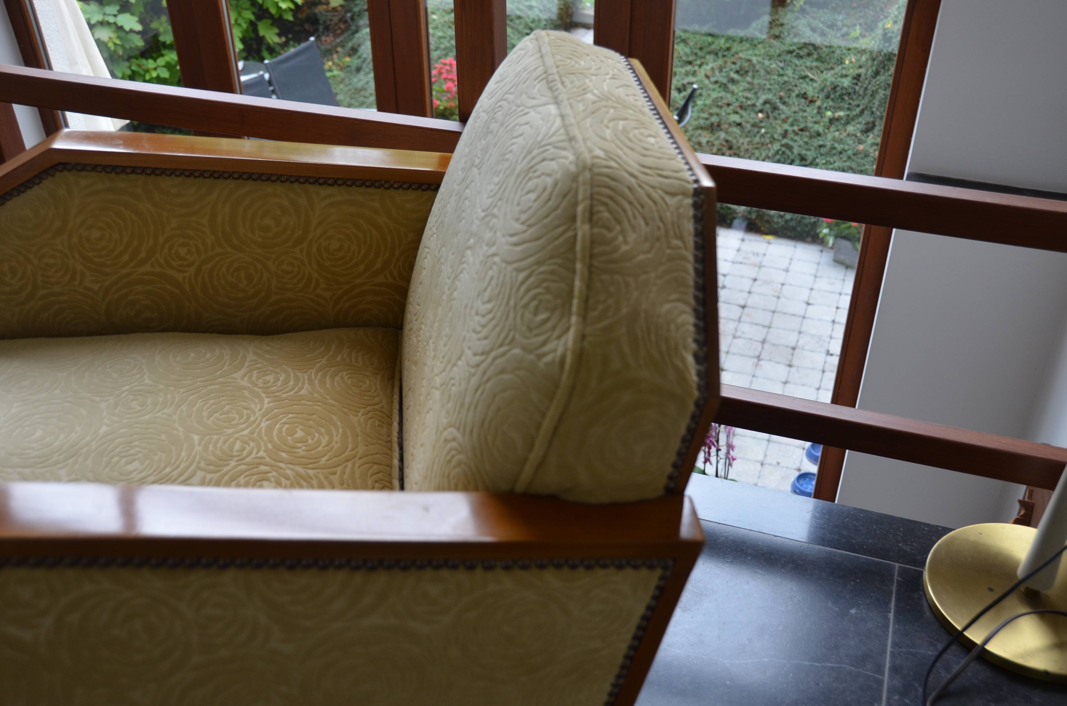 Pair of Art Deco armchairs and poufs