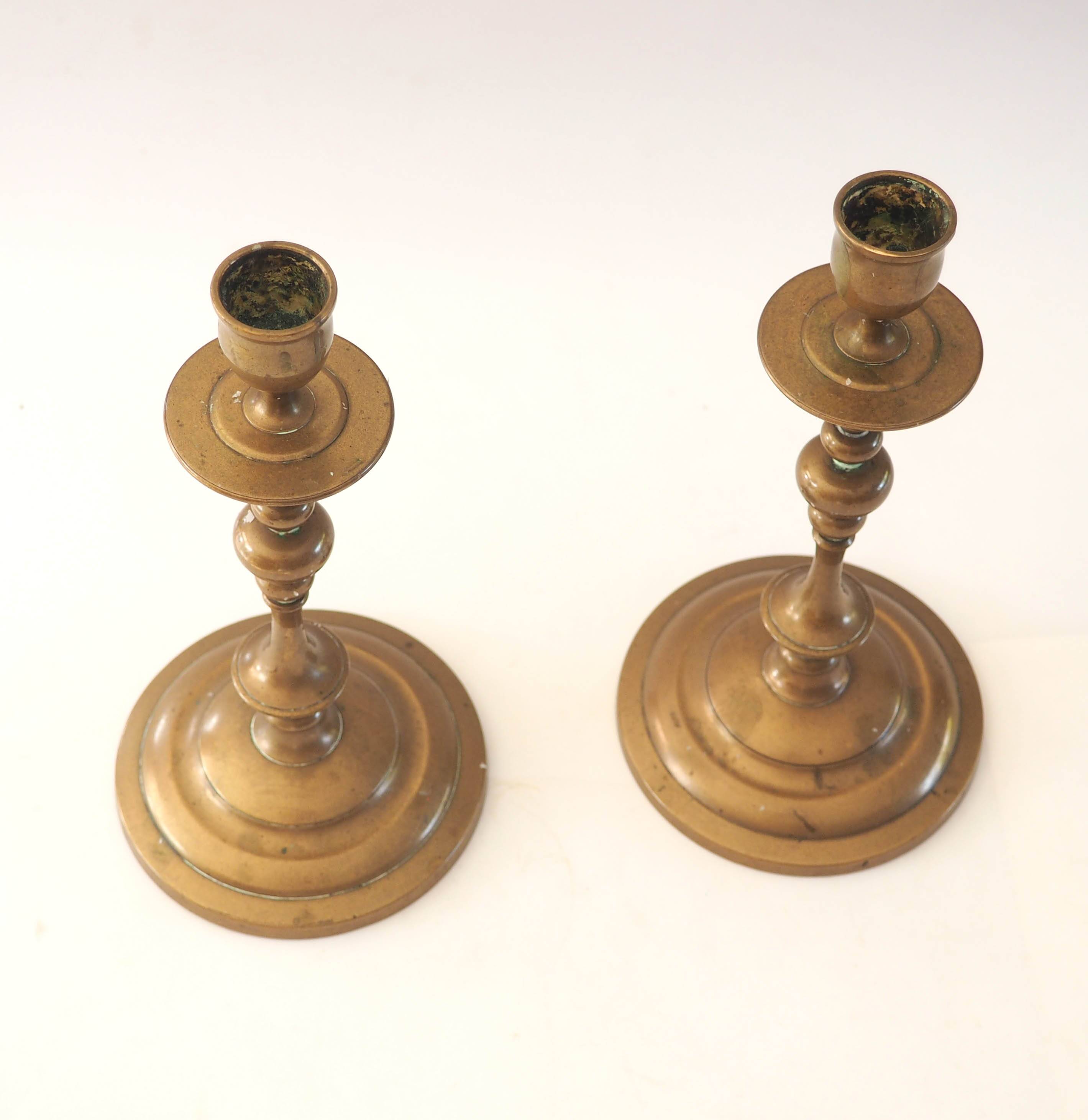 Pair of bronze candlesticks