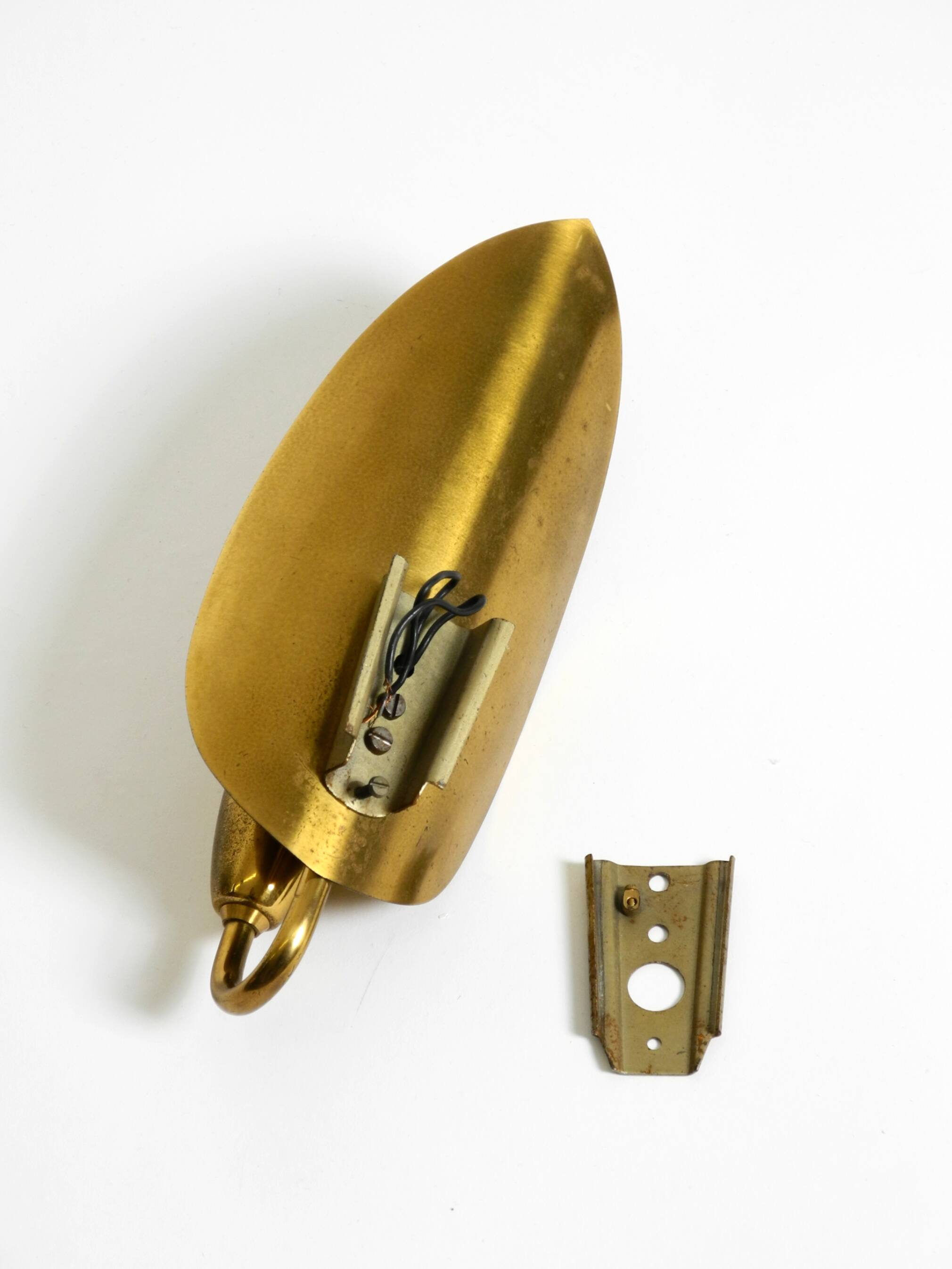 Beautiful original Mid Century Modern cone wall lamp made of brass