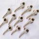 White and gold Limoges porcelain knife rests - animal motif: fish