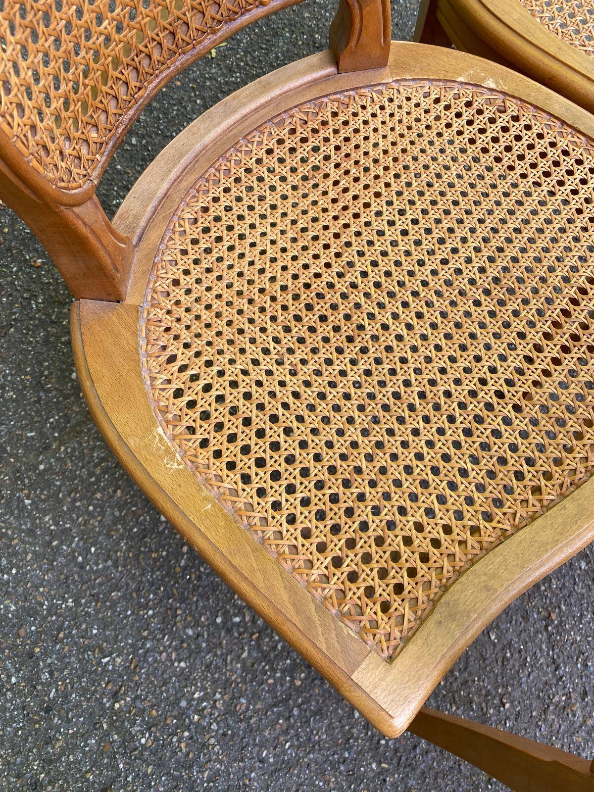 4 Louis XV dining chairs in light solid oak with caning.