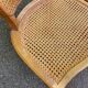 4 Louis XV dining chairs in light solid oak with caning.