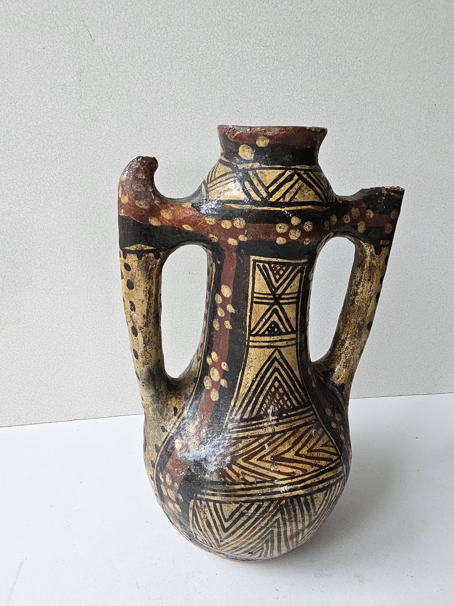 Kabyle Algerian pottery oil jar with polychrome geometric decorations