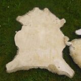 Two vintage sheepskins.