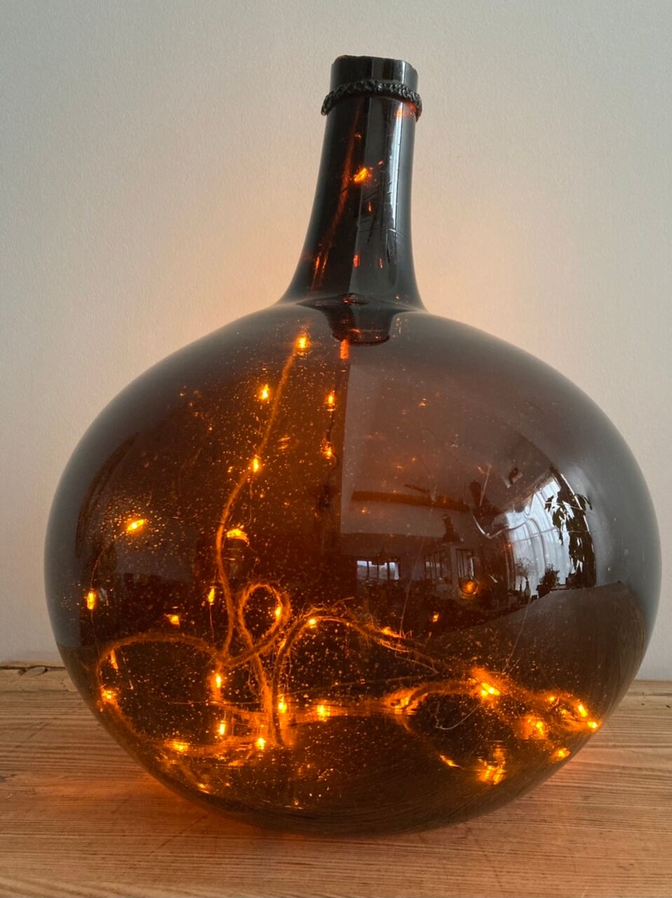 Old amber demijohn