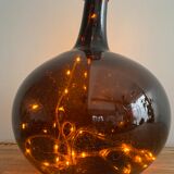 Old amber demijohn