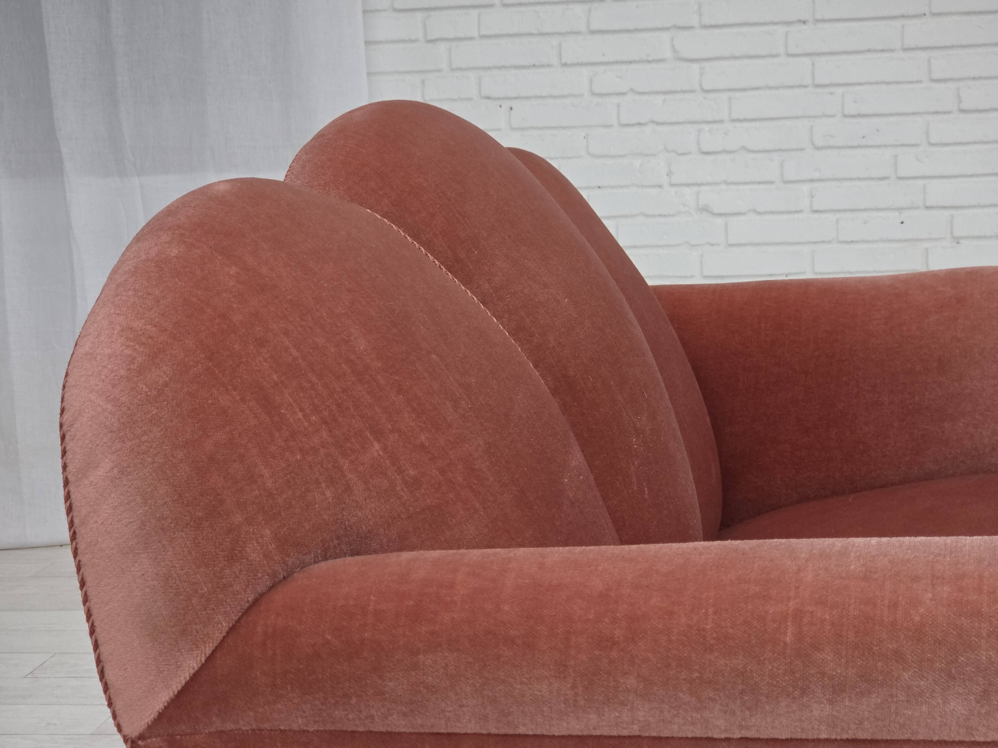 1950s, Danish 2-seater sofa, salmon pink furniture velour, oak wood legs.