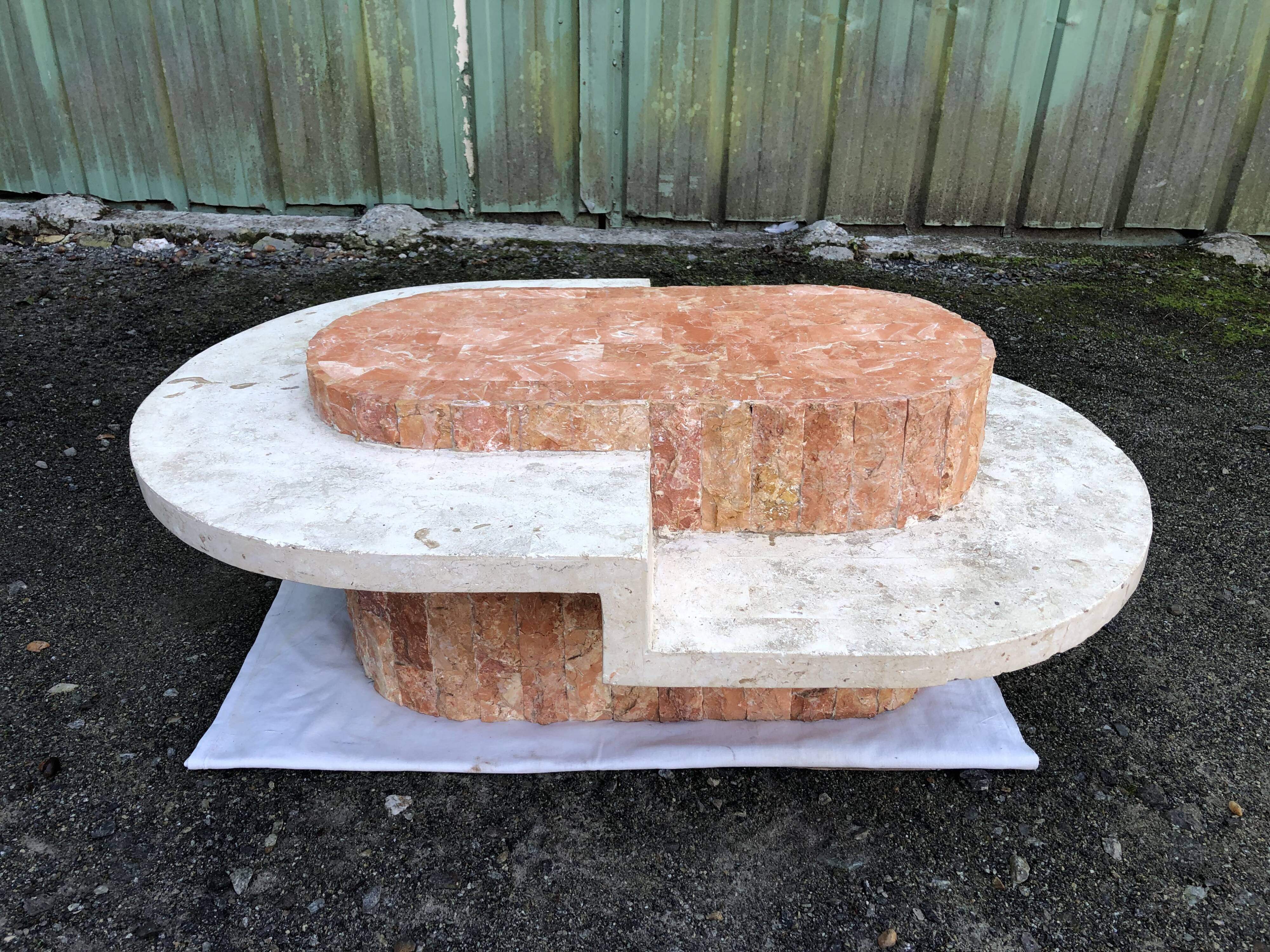 Vintage asymmetrical design coffee table in Mactan travertine stones by Magnussen ponte.
