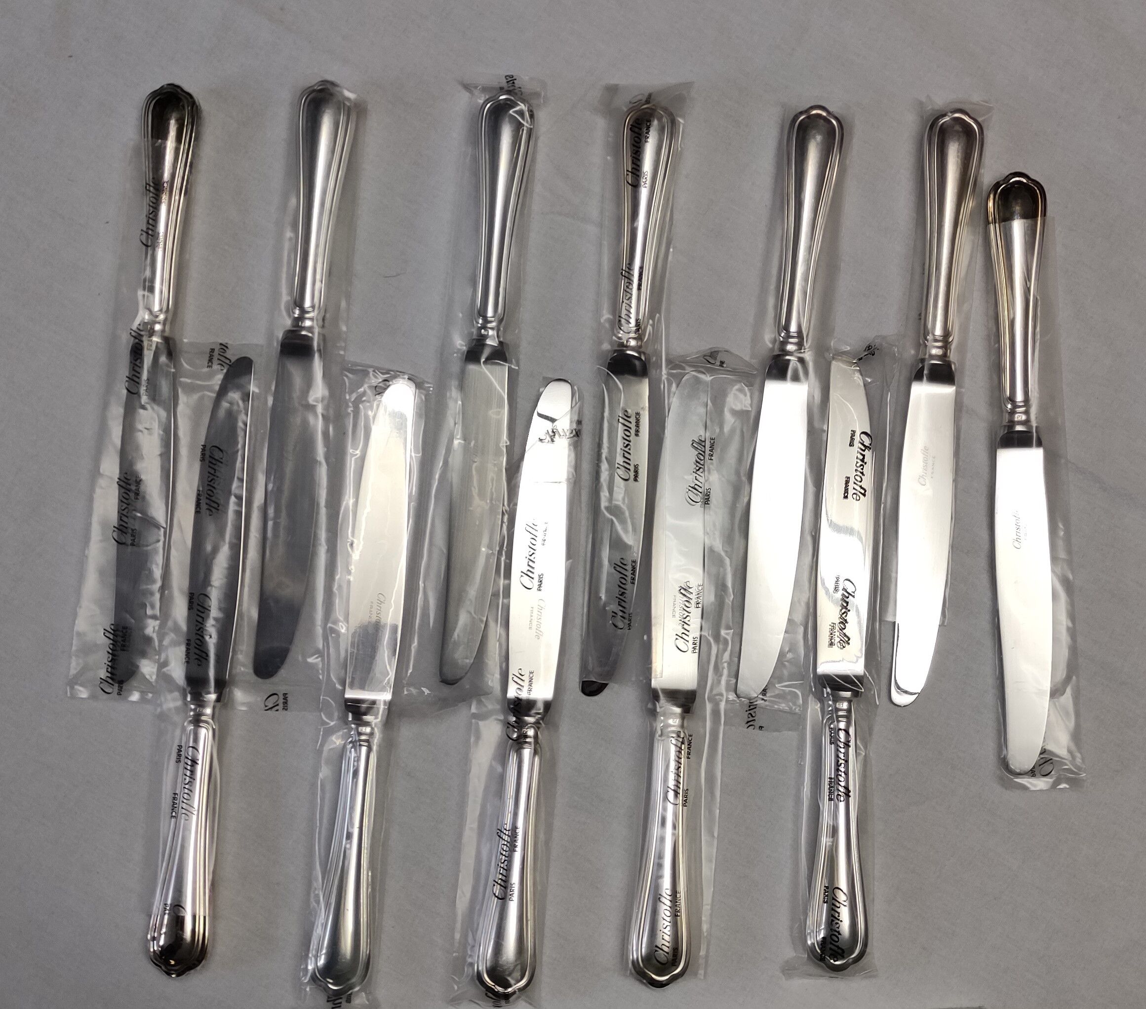 set of 12 silver metal table knives from Christofle model "Spatours"