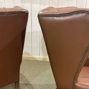 Pair of 1970s Chesterfield wingback chairs in brown leather