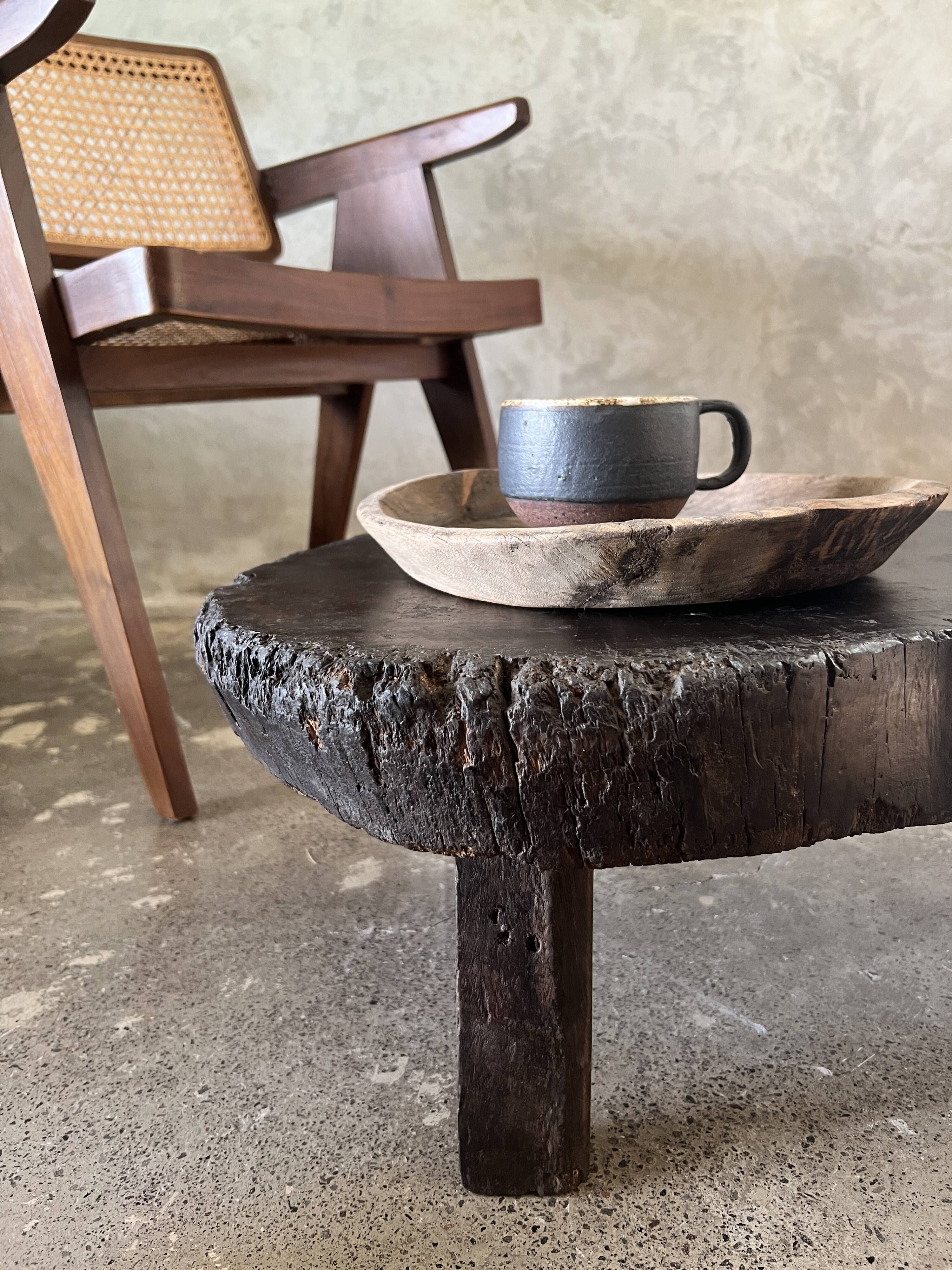 Small old Asian wooden coffee table in Japanese style, kidney-shaped top