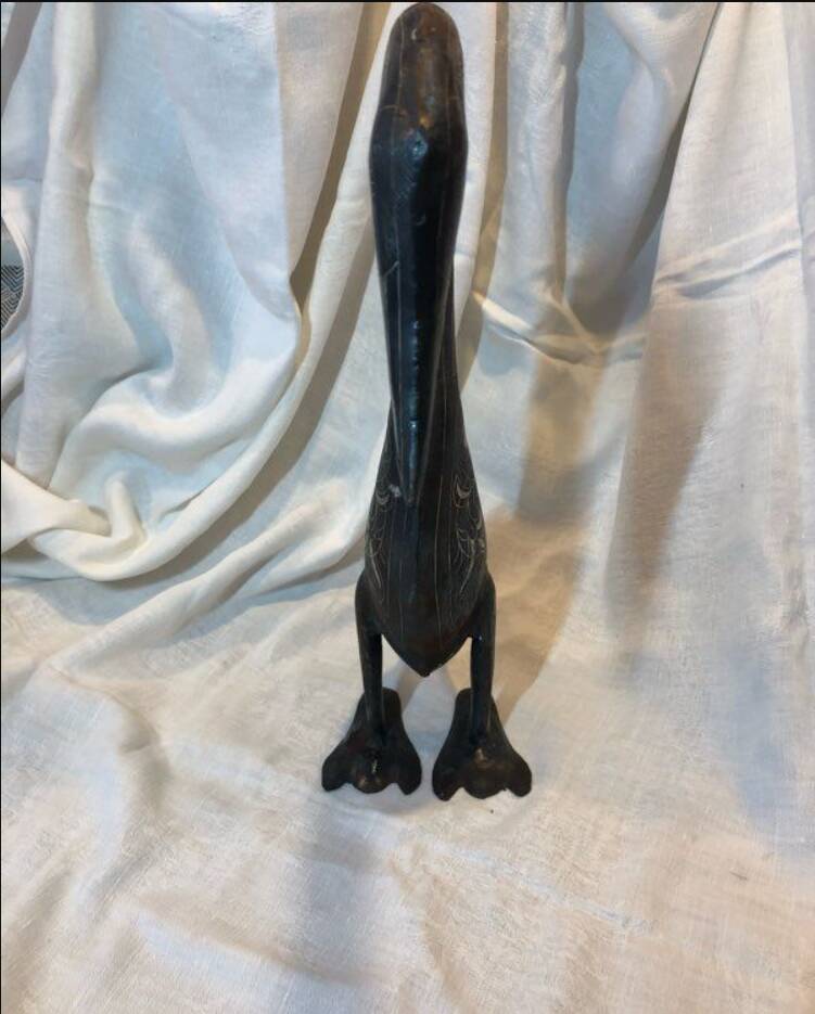 Damascened metal bird sculpture