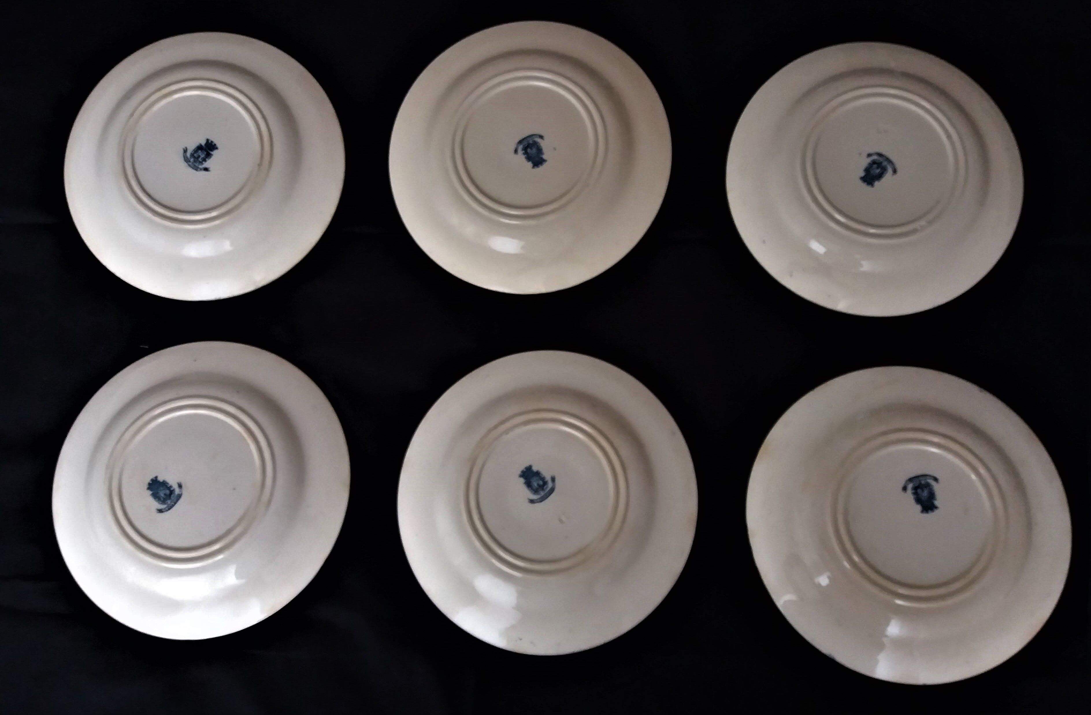 Lot of six flat plates in earthenware Gien décor blue thistles