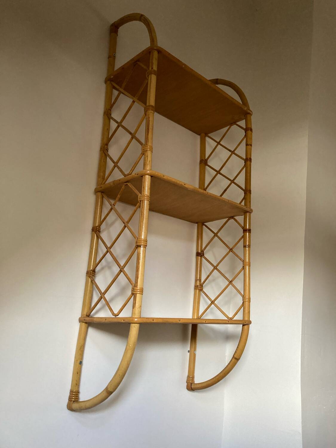 Vintage vertical wall mounted rattan shelf