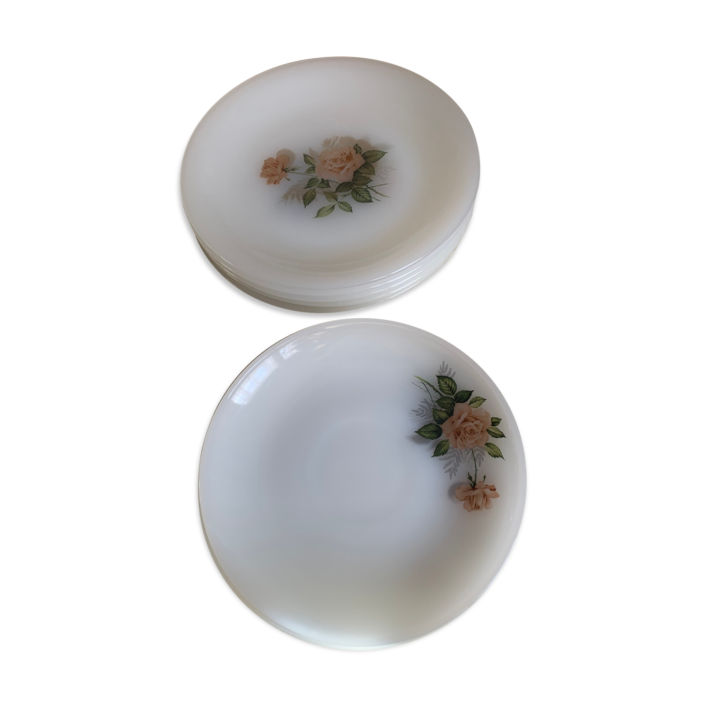 Lots of vintage plates in arcopal floral pattern