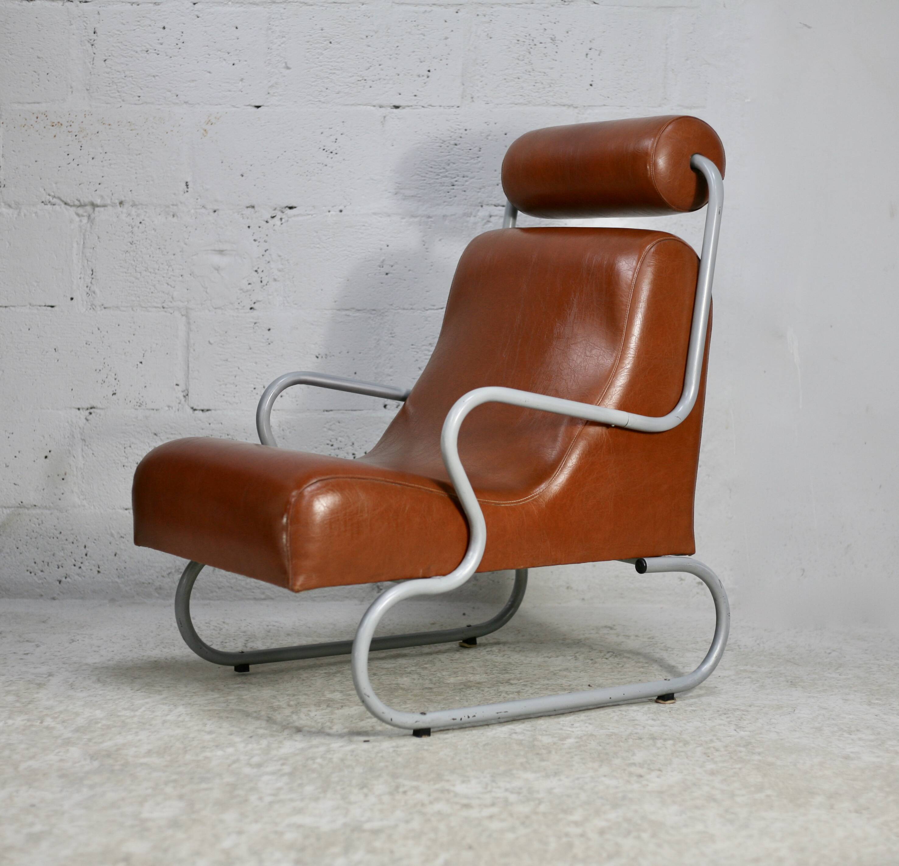 Space age armchair, metal and imitation leather. Circa 1960