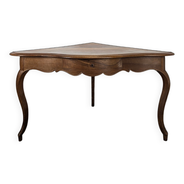 Louis XV corner table in walnut with curved legs.