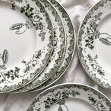 8 flat plates in iron earth "Modern Style" Saint Amand early 20th century