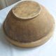 Large old salad bowl in yellow varnished earth