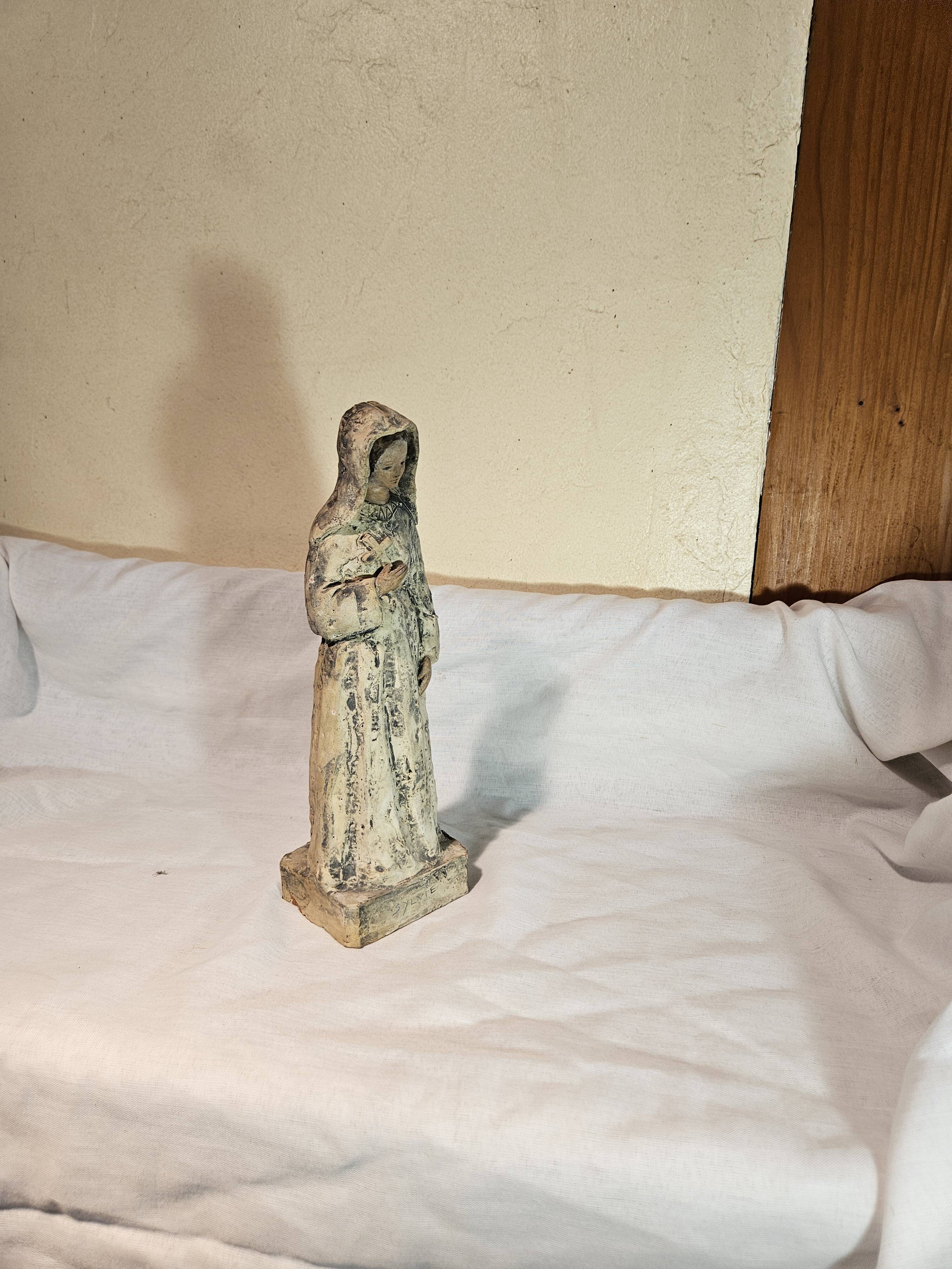 Painted terracotta holy virgin statue
