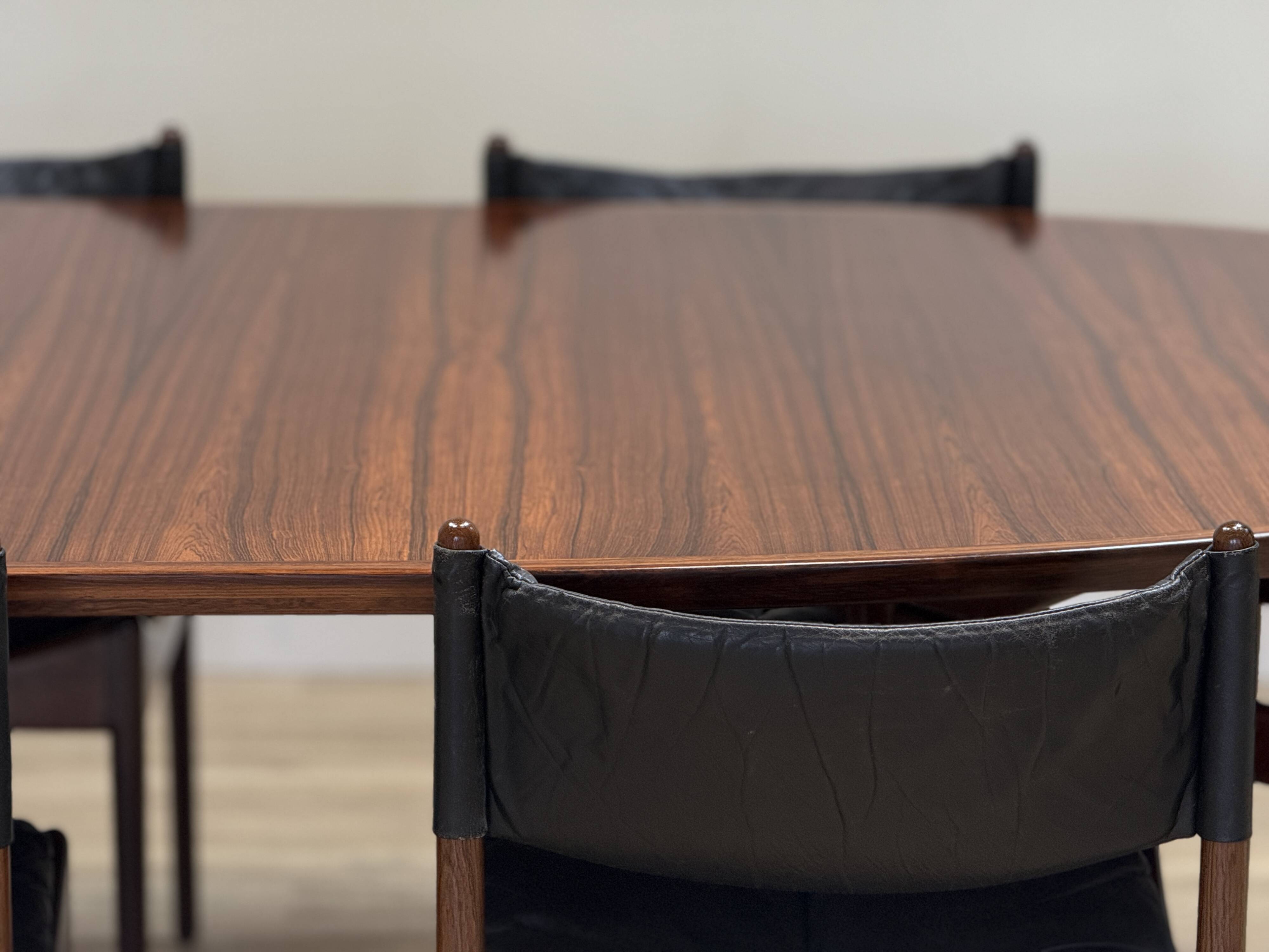 Extendable dining room table and chairs (by Kristian Solmer Vedel)