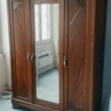 Old art nouveau 3-door wardrobe with mercury mirror
