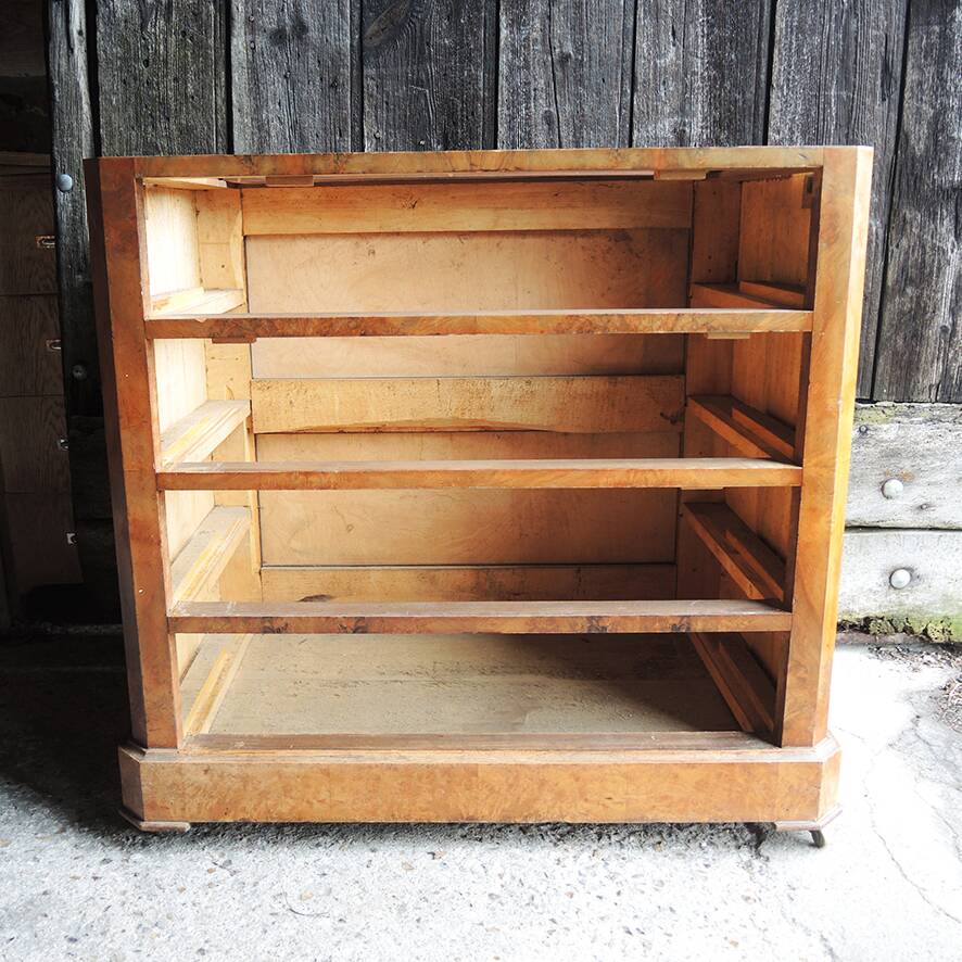 Old wooden chest of drawers with 4 drawers on wheels