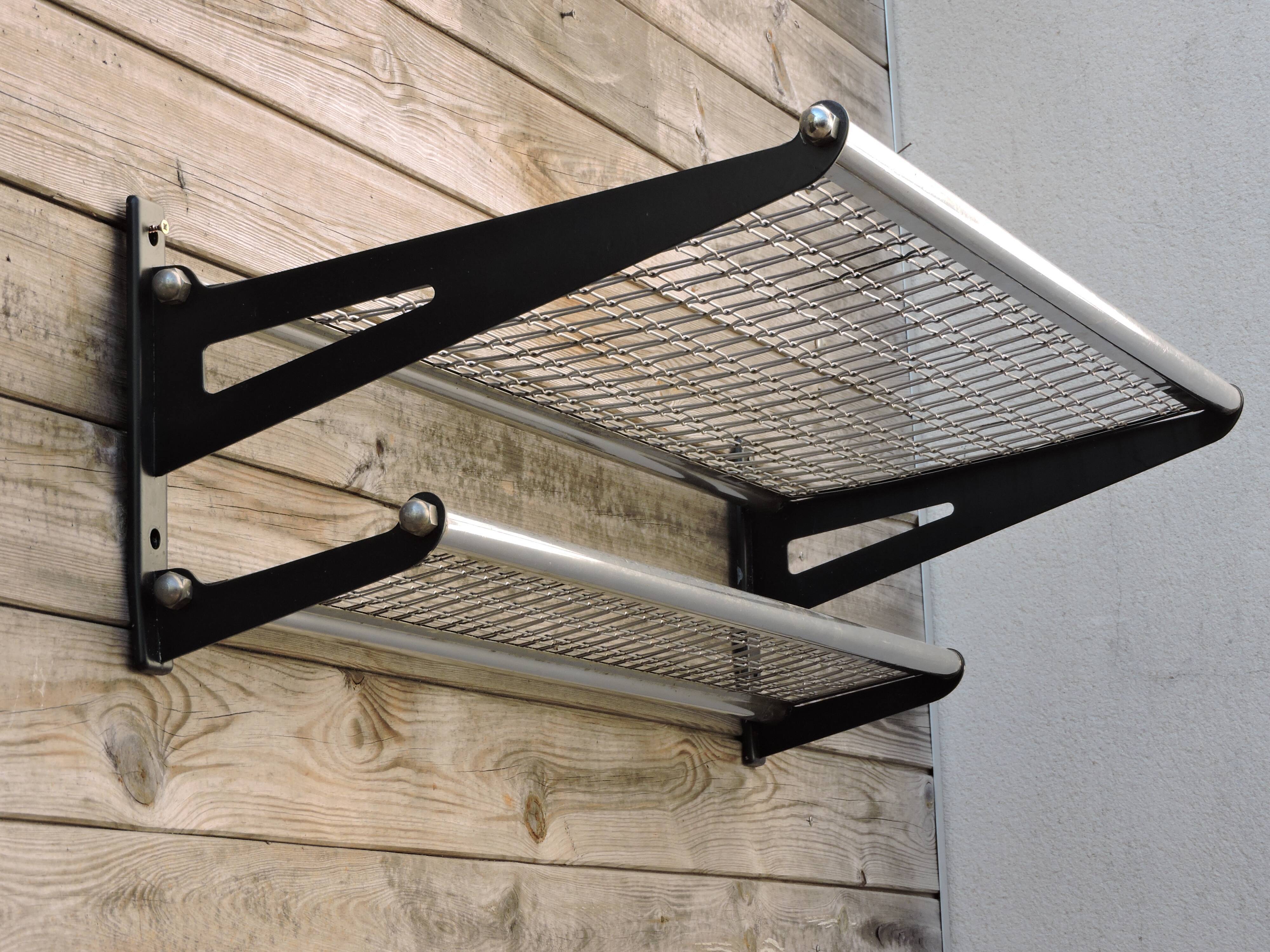 Shelve carries vintage sncf train luggage