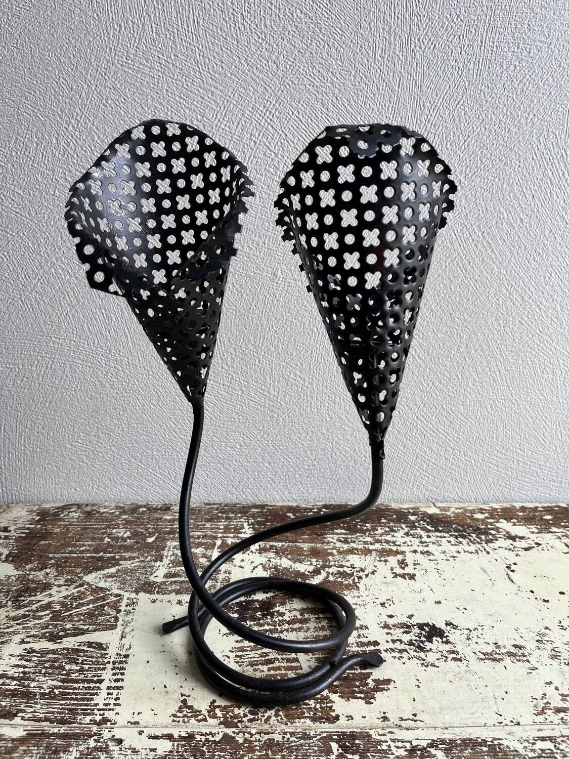 Perforated metal tealight candle holder