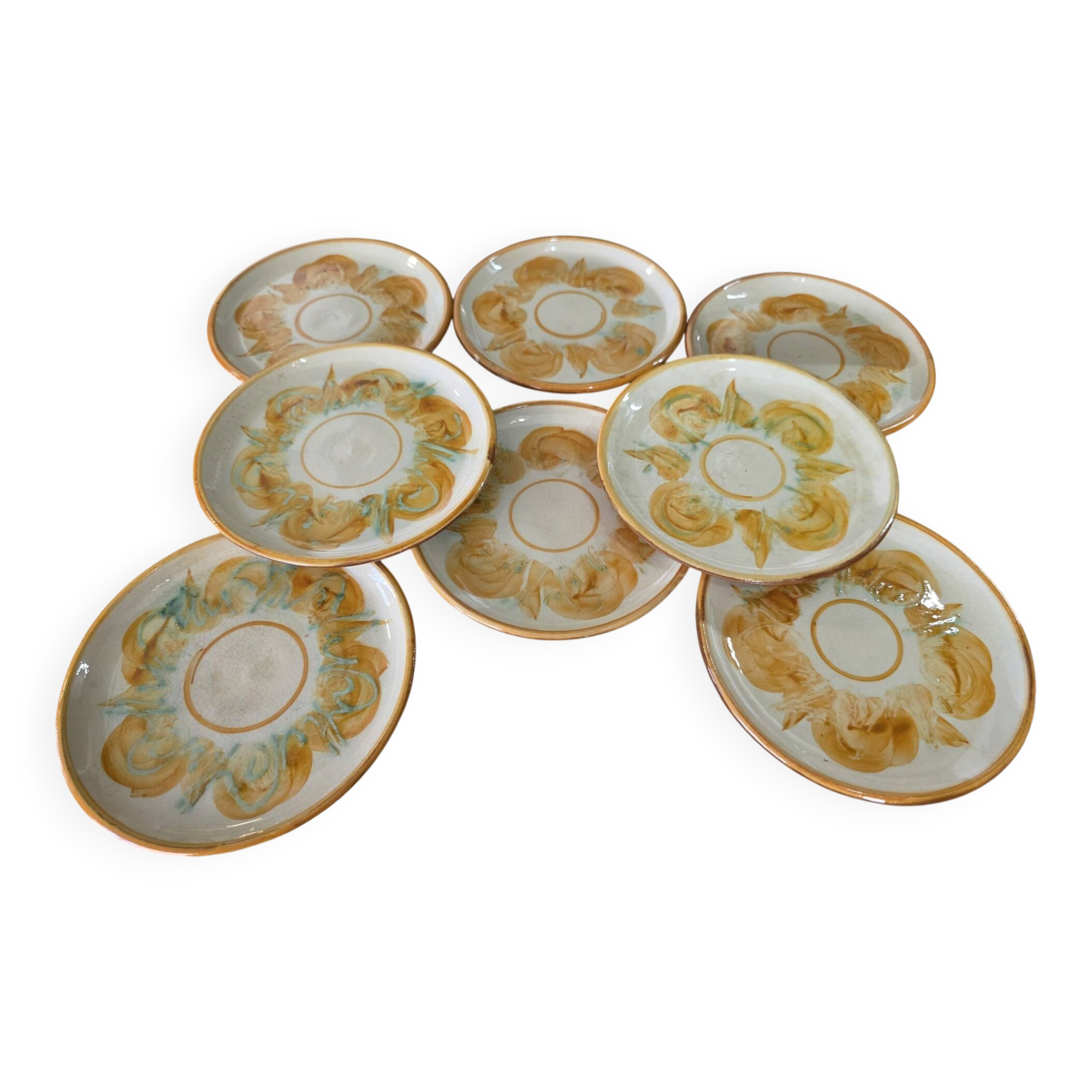 8 vintage dessert plates with a signed decoration.