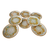 Set of 8 vintage dessert plates with signed decoration.