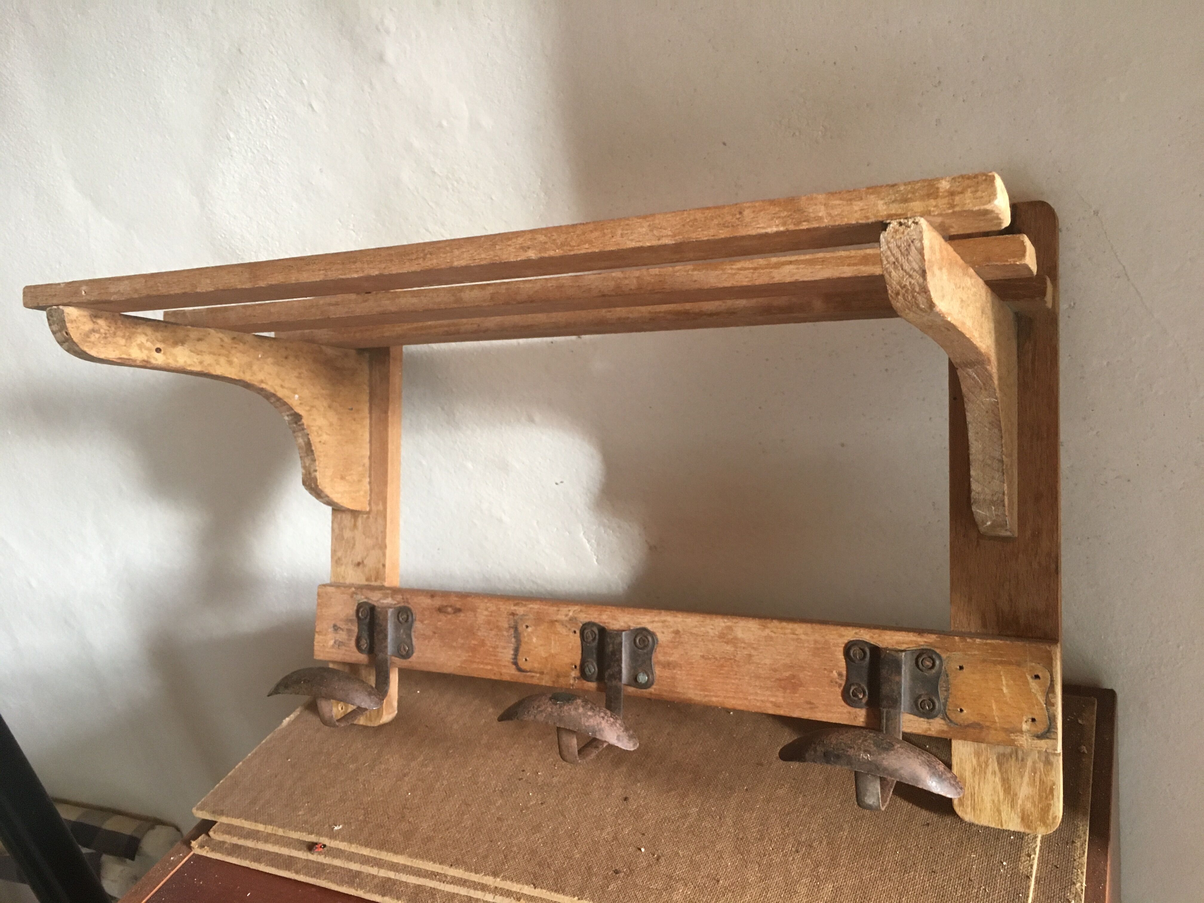 Wood shelf and metal hooks