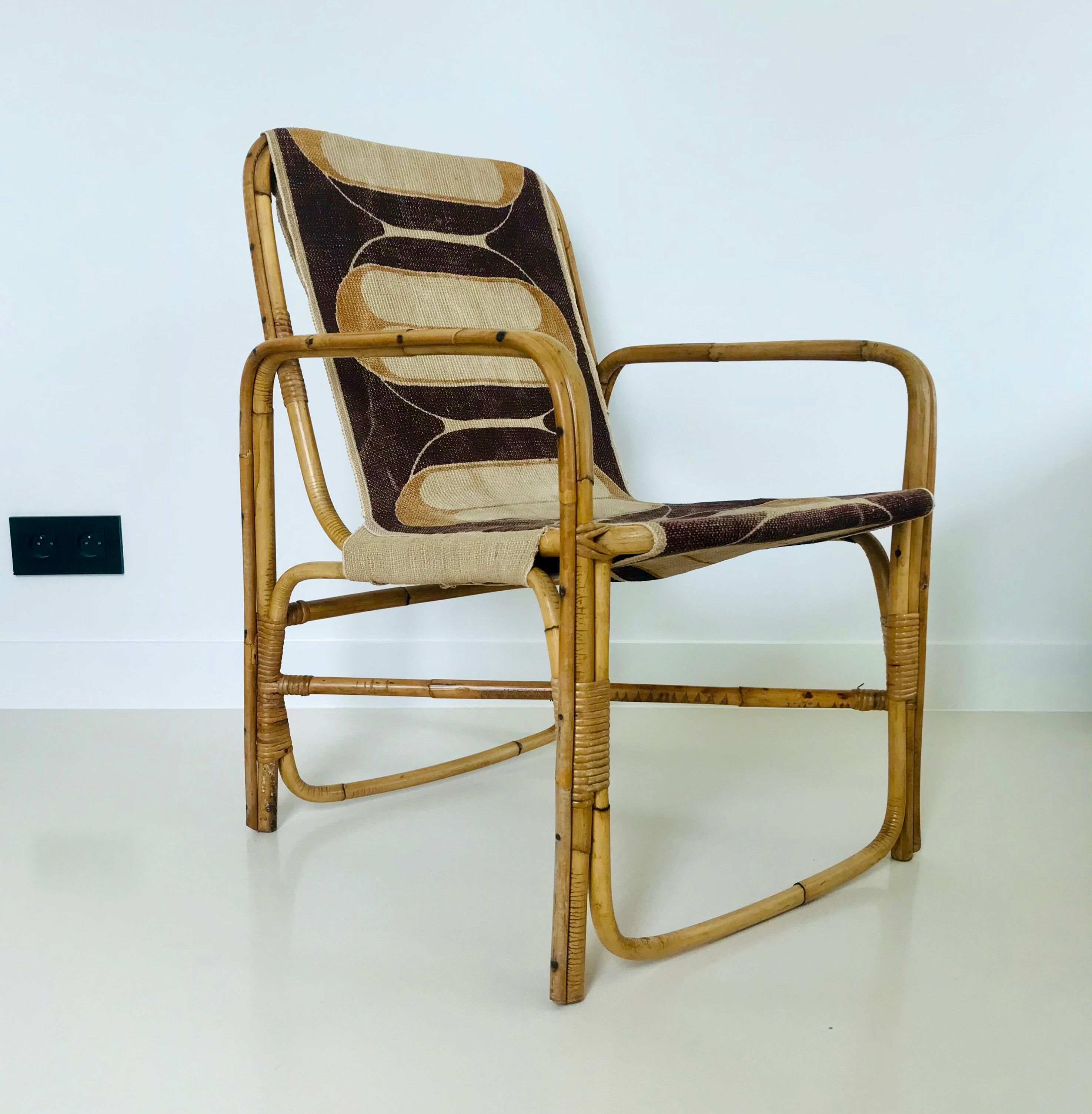 Rattan armchair and fabric, France 60s
