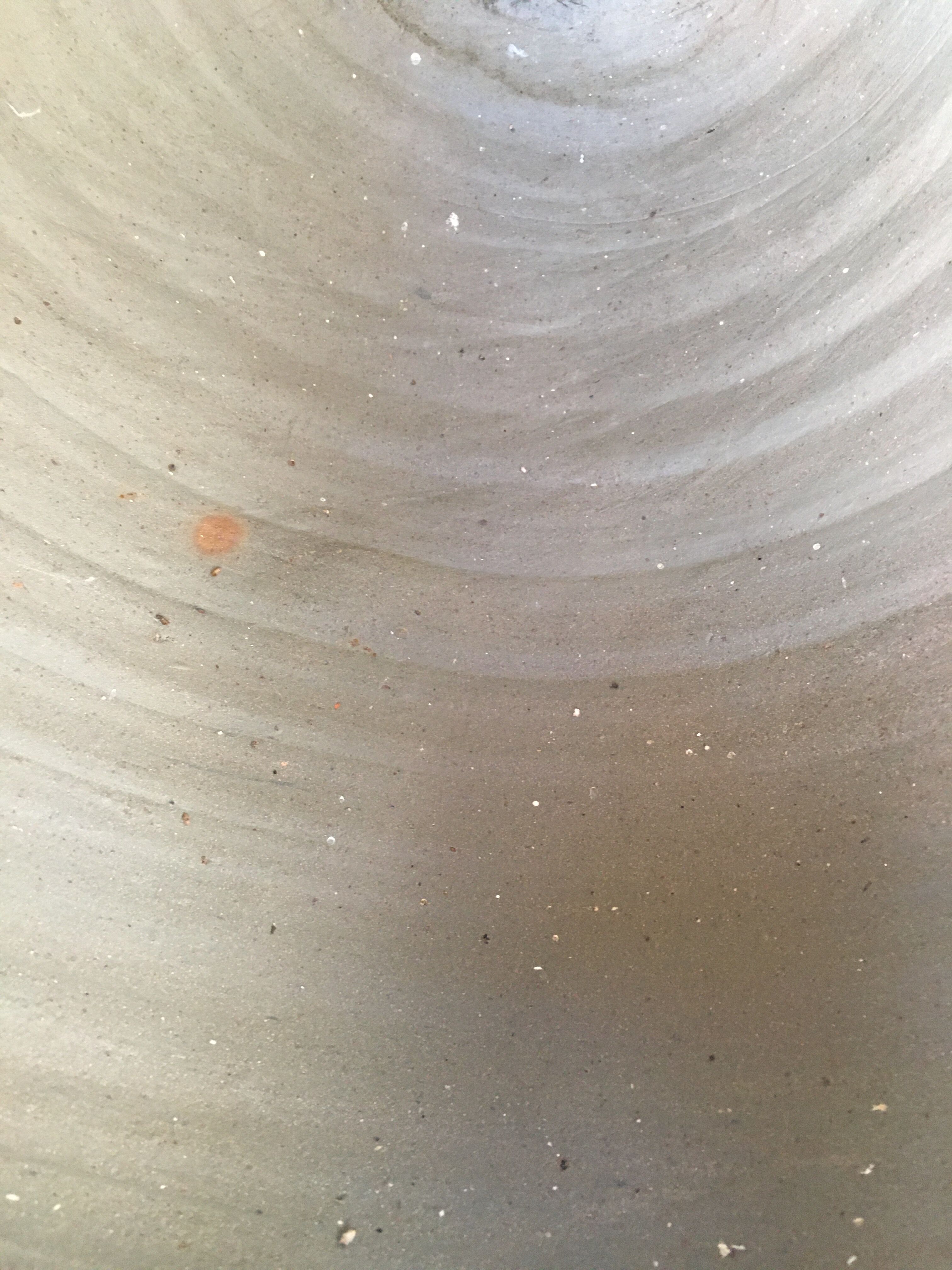 Old jug with two sandstone handles