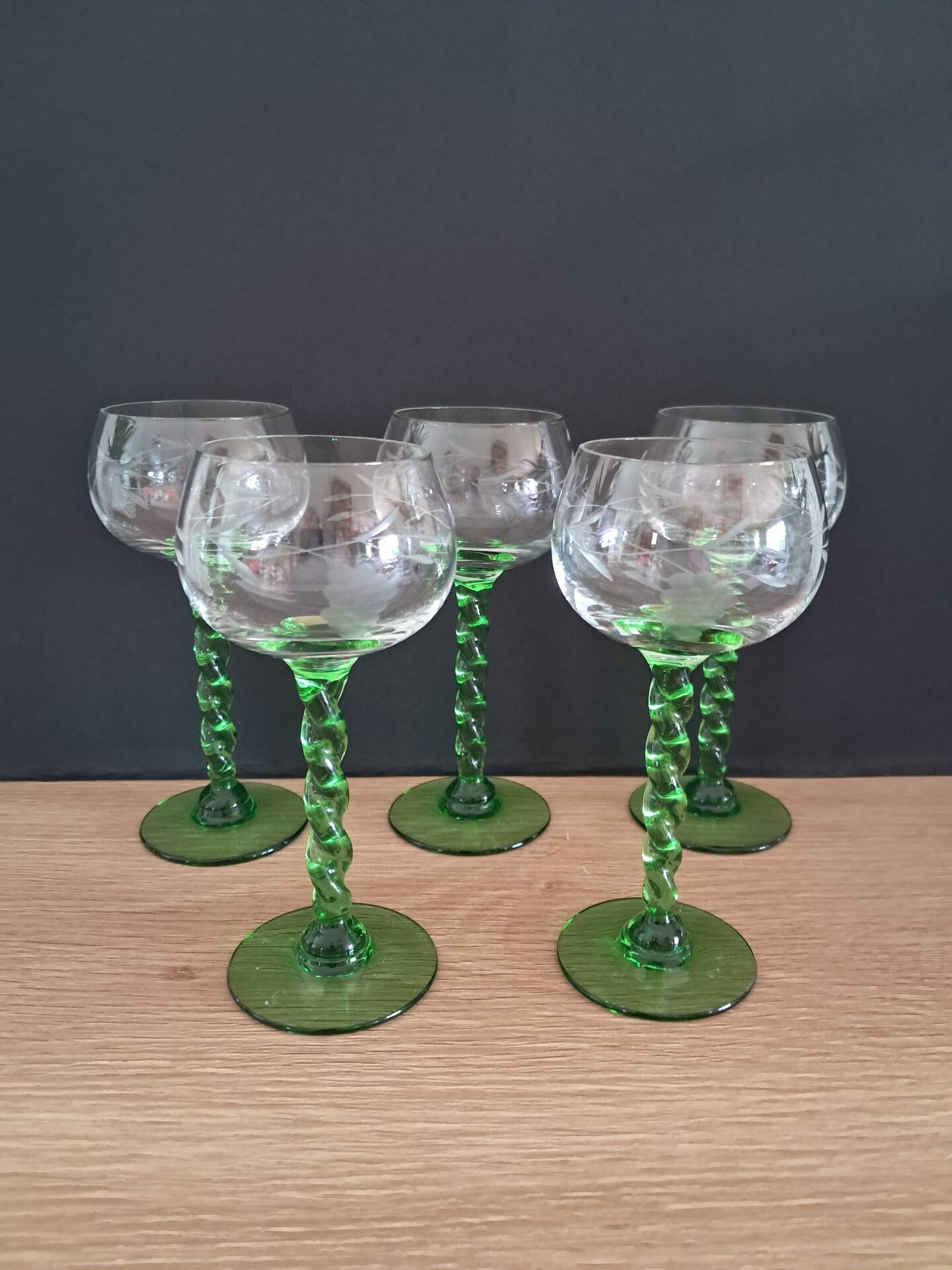 5 white wine glasses with twisted stems
