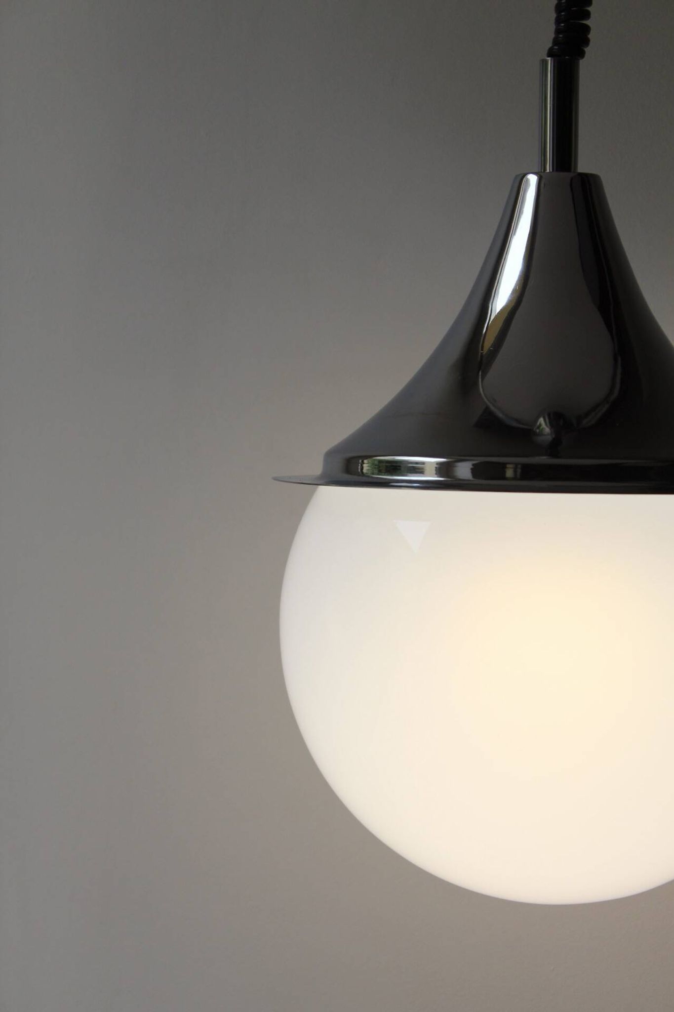Space age glass and chrome ball suspension