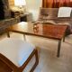 Coffee table - gold metal base with a beautiful patina