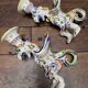 Griffon candlesticks in Old Rouen earthenware