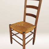 Set of six rush-seated ladderback chairs.