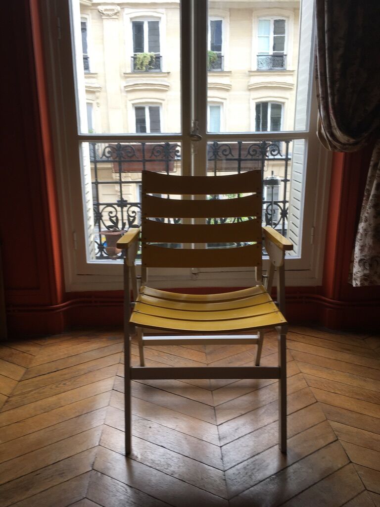 Vintage foldable wooden armchair