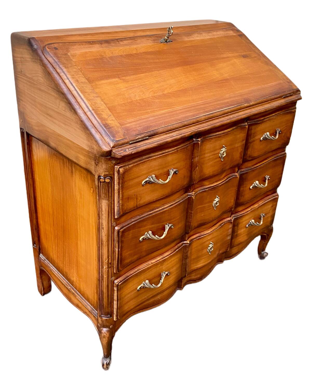 Secretary desk called "scriban" in Louis XV style made of fruitwood.