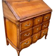 Secretary desk called "scriban" in Louis XV style made of fruitwood.