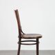 Chaise bistro en bois vintage intemporelle Cosmos avec de magnifiques sculptures.