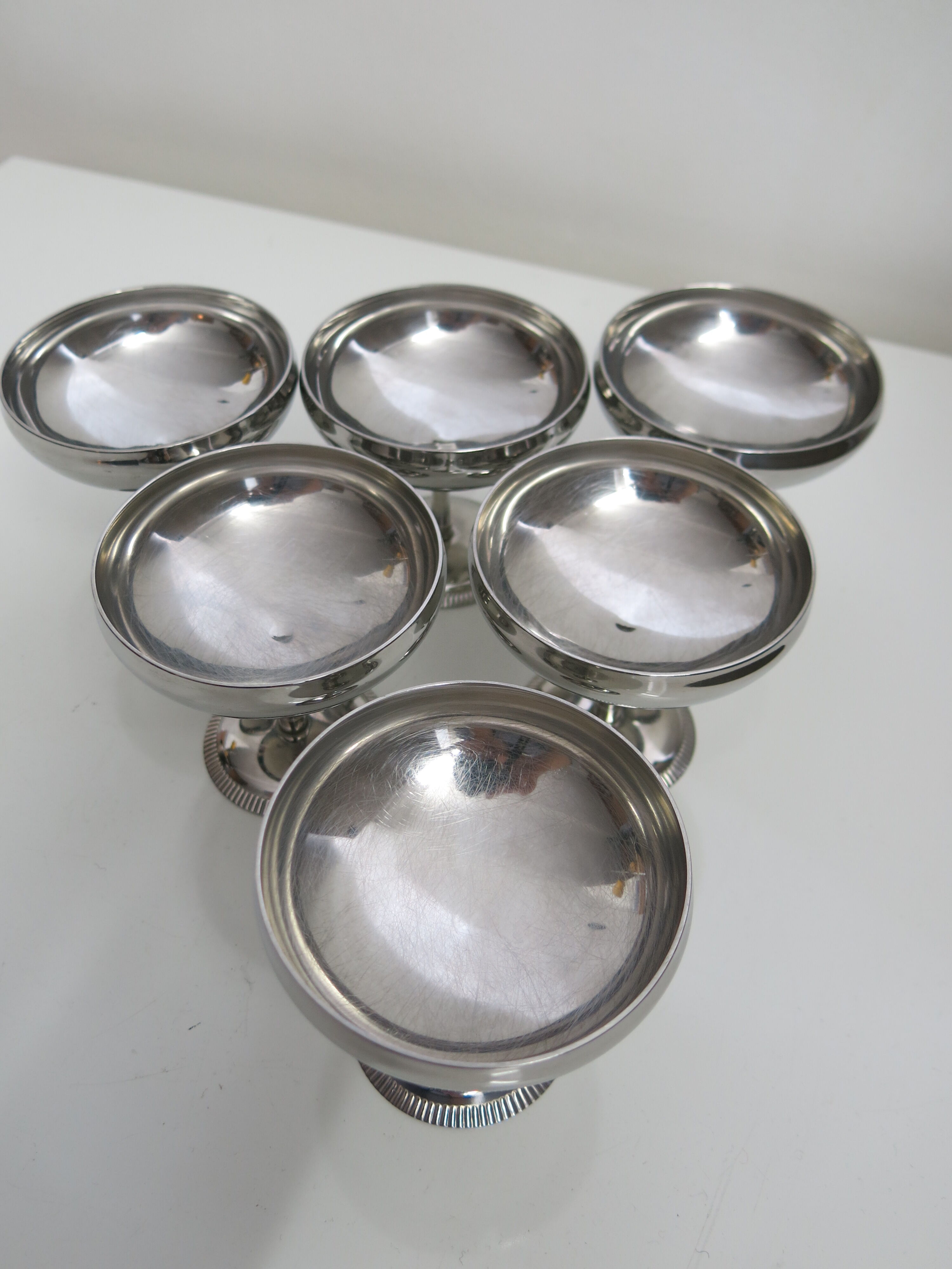 Set of six stainless steel cups from Letang-Rémy