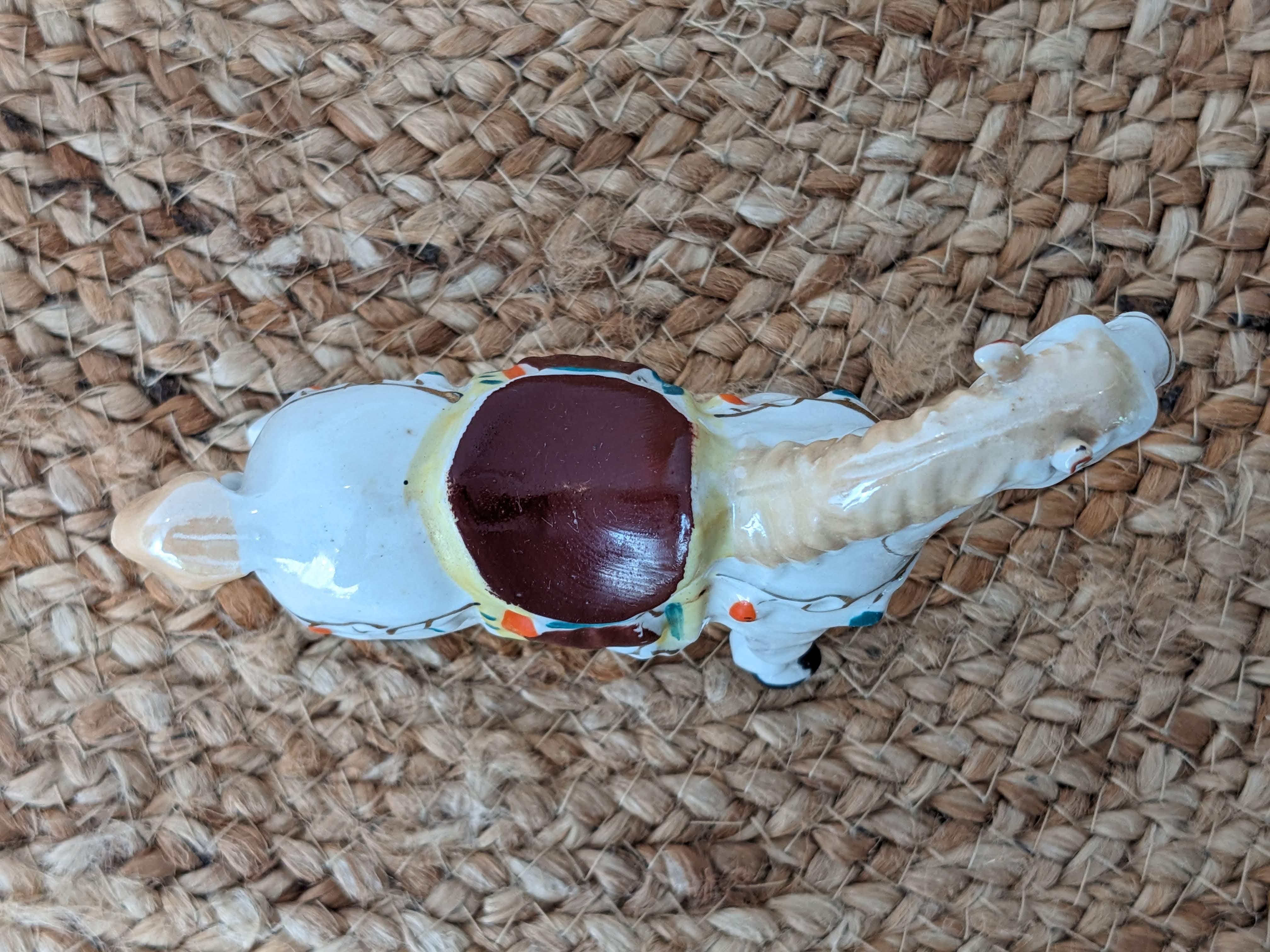 Painted porcelain horse statuette