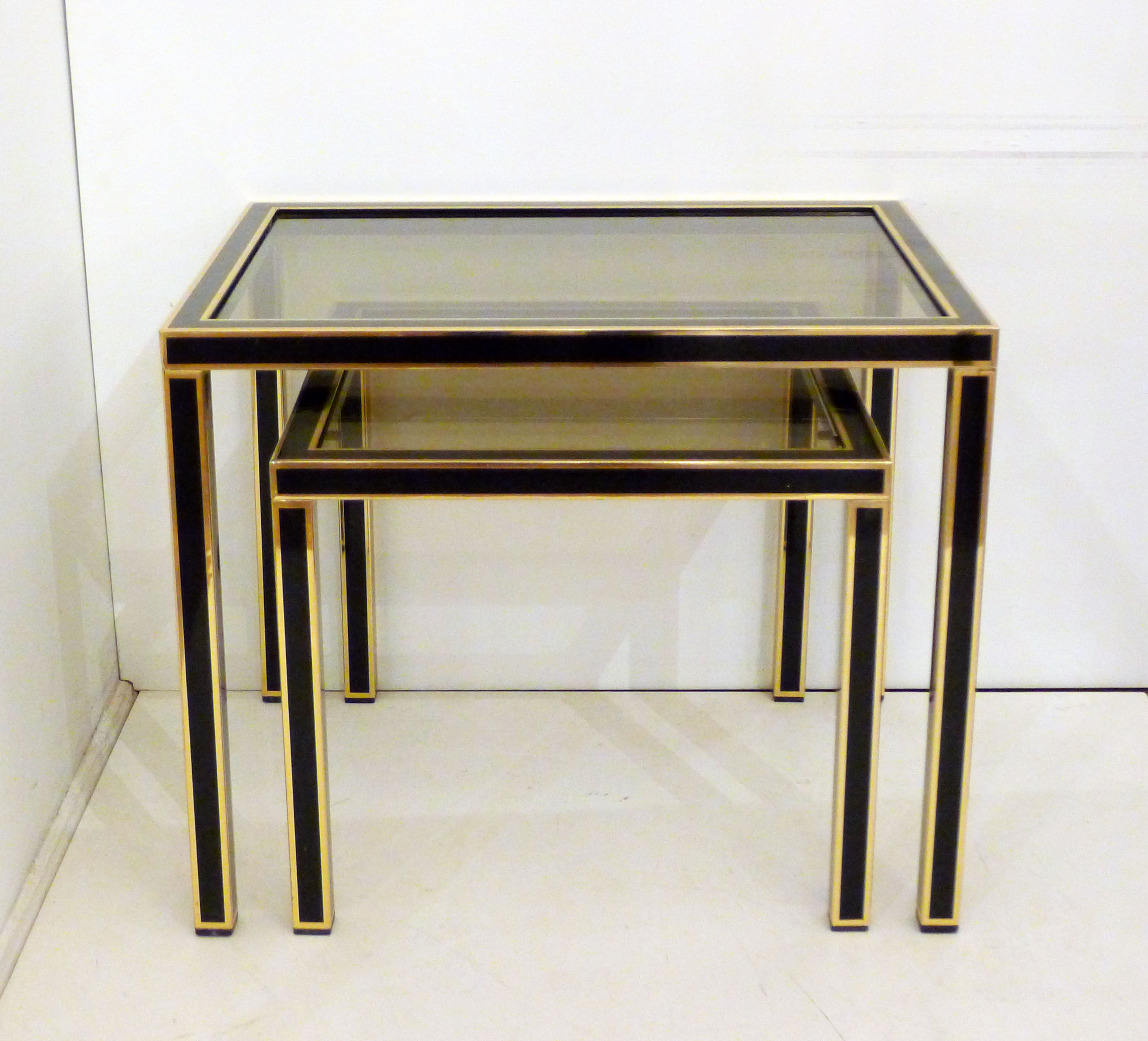 Pair of black & gold trundle tables 1970'